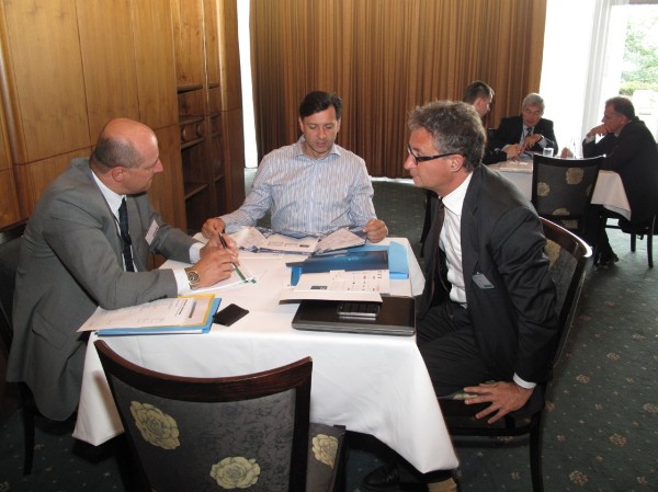 Attendees participate in a bilateral interview session during the first European business-to-business speed-networking event in May.